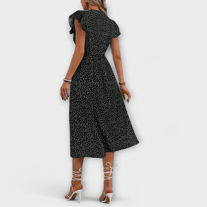 Elegante vestido midi de lunares