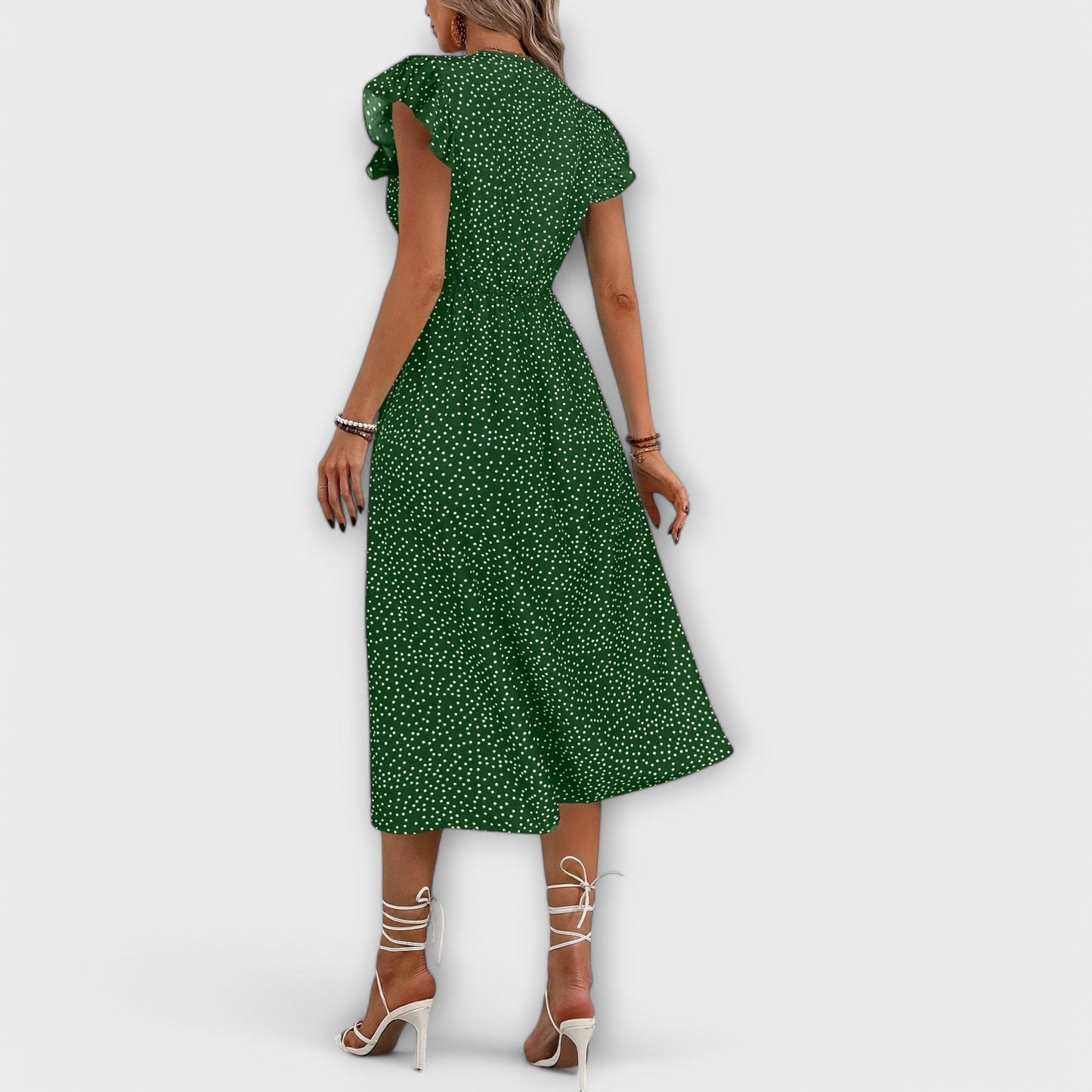 Elegante vestido midi de lunares