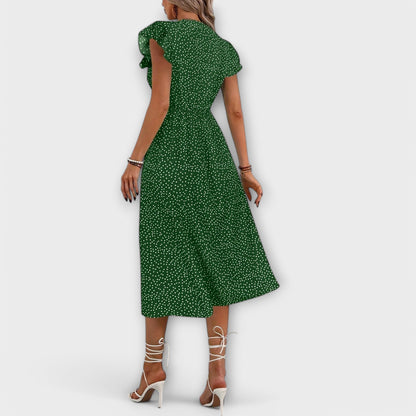 Elegante vestido midi de lunares