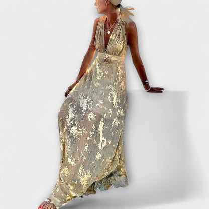 Vestido fluido con escote en V y detalles de lentejuelas